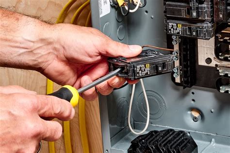 electrician training in replacing main electrical box circuit breaker|200 amp main breaker replacement.